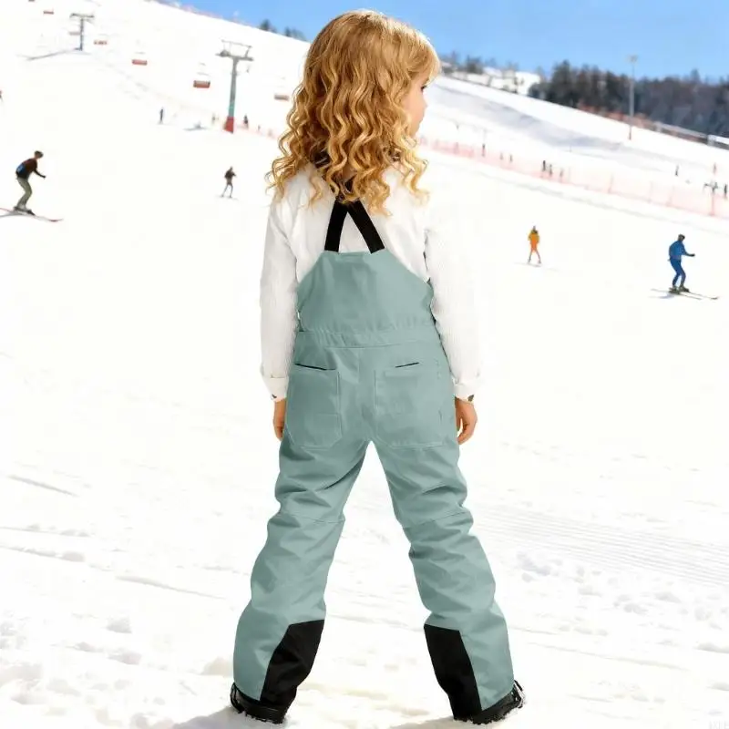 Dziecięce spodnie narciarskie  – Kids Outdoor Overalls recenzja i cena